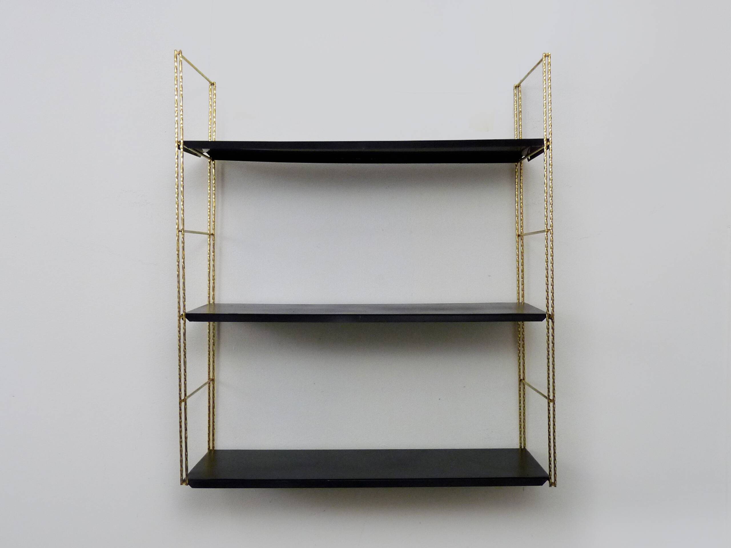 Vintage black and gold String design shelf. 60s