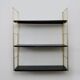 Vintage black and gold String design shelf. 60s