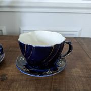 Set of two large Lunéville cups and saucers