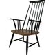 Vintage easy chair with high back and armrest from the 60s