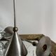 Pair of high vintage metal and brass candlesticks
