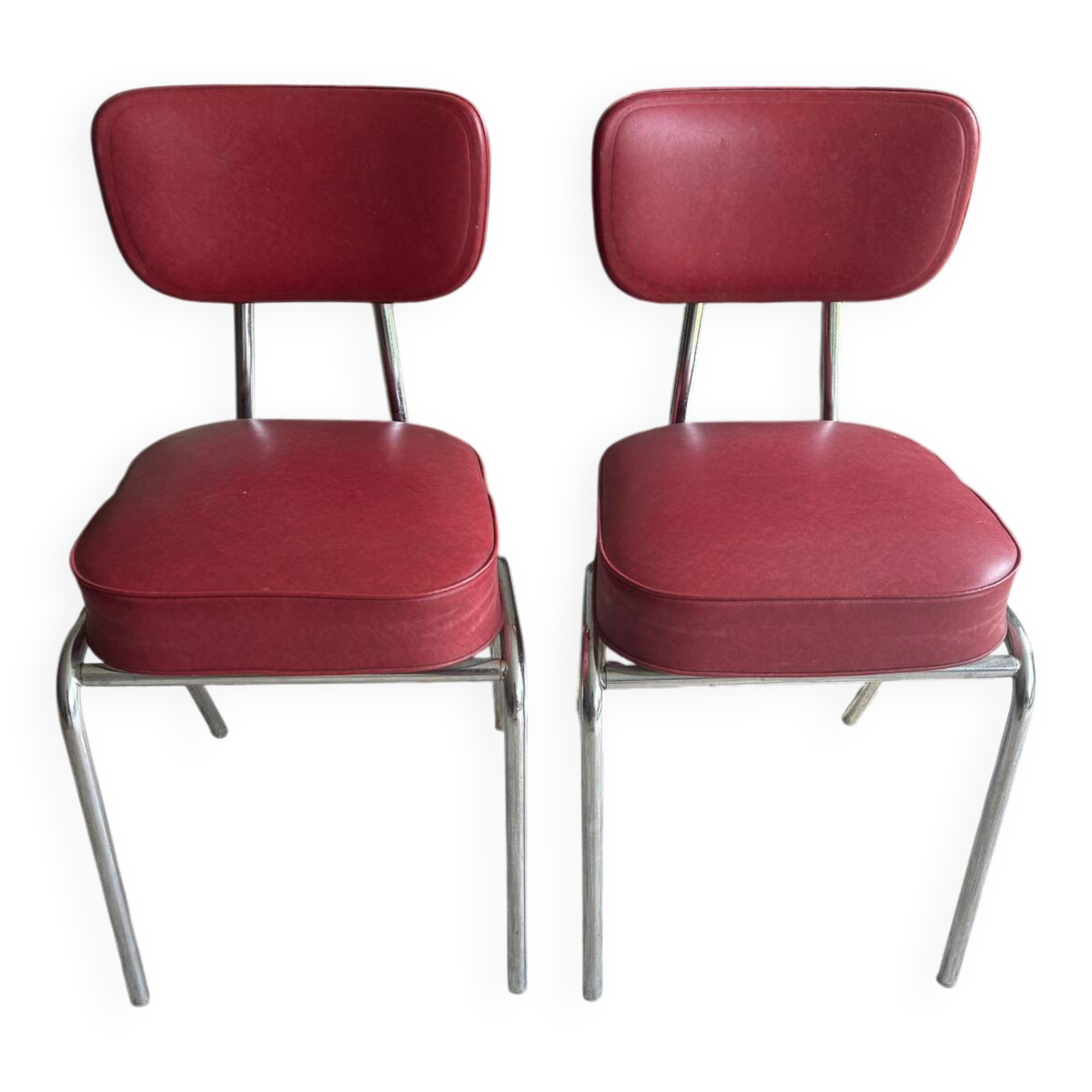 2 vintage red faux leather chairs