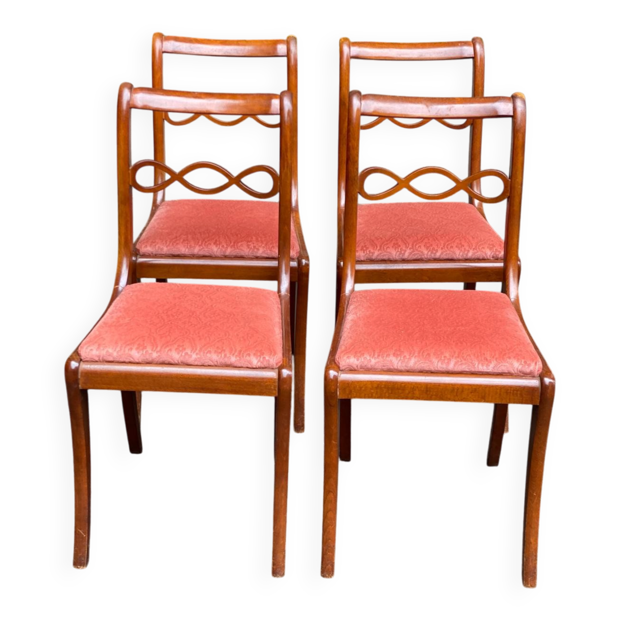 4 dining chairs made of solid wood and pink velvet fabric from the 1950s.