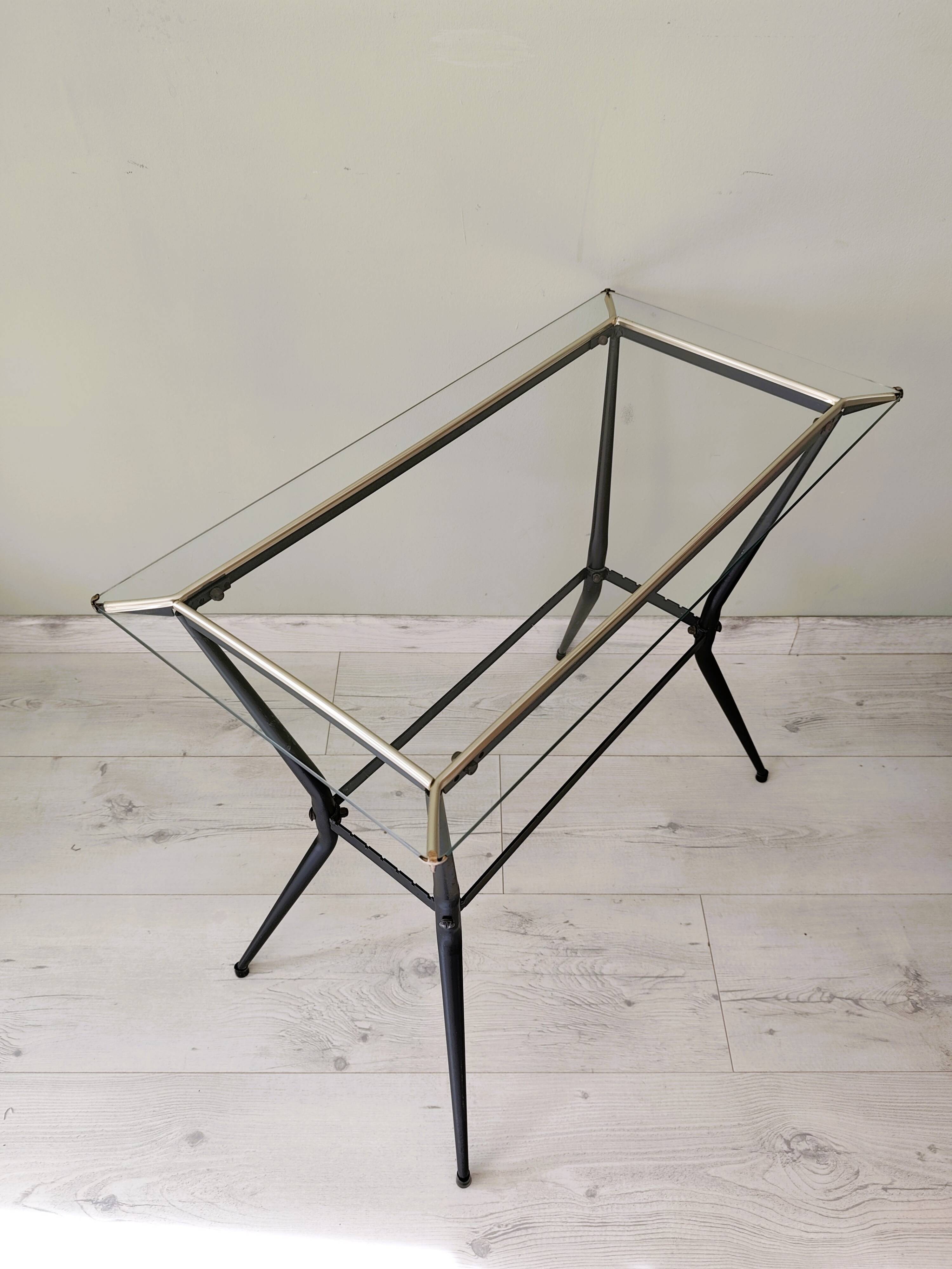 Antique side table made of metal and glass