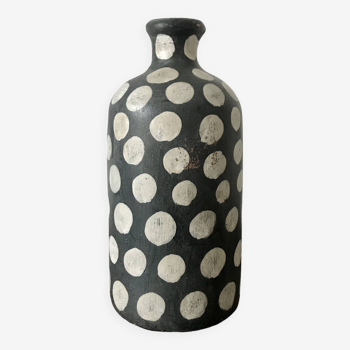 Terracotta vase painted with polka dots