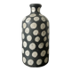 Terracotta vase painted with polka dots