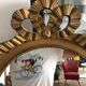 Old oval mirror with a pediment