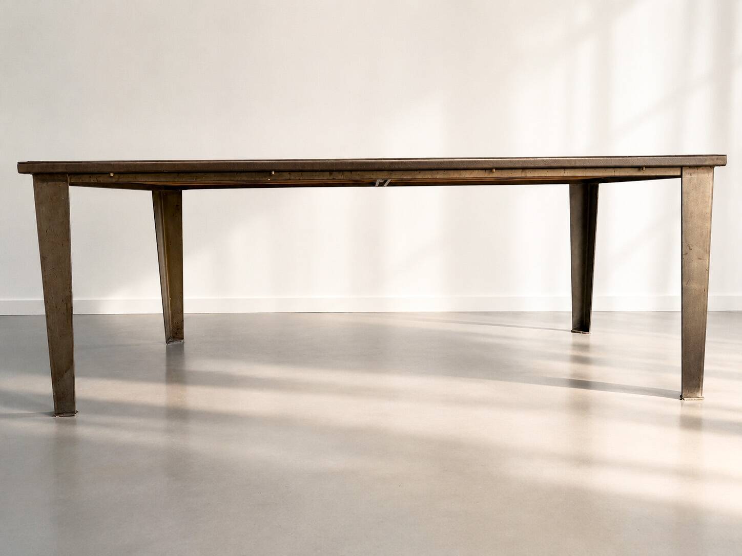 Industrial table made from old bumper car flooring.