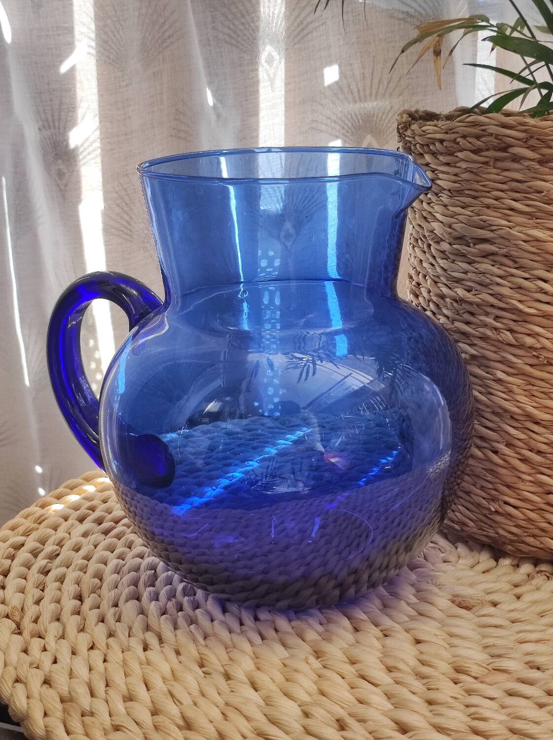 Vintage blue glass pitcher