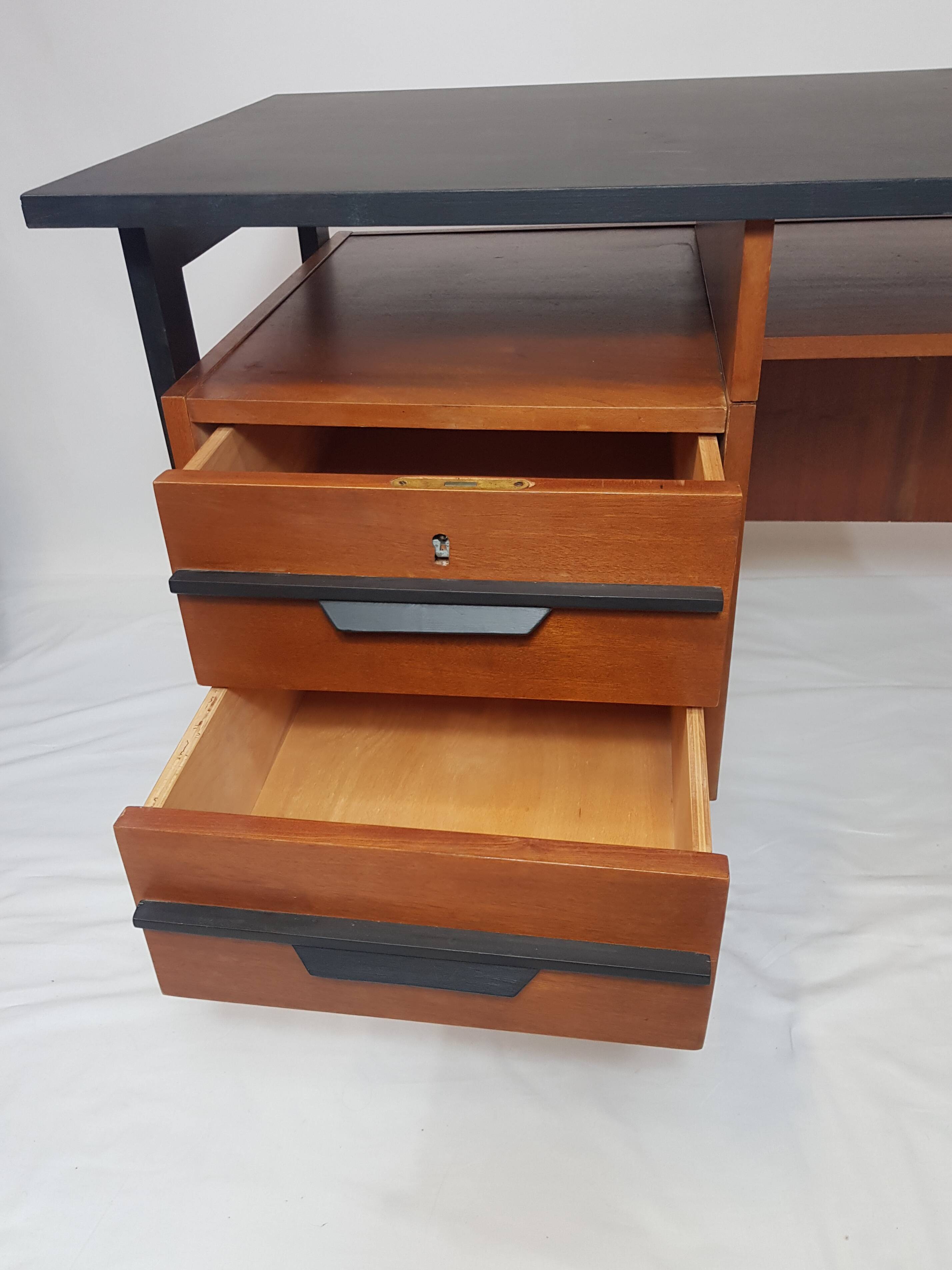 Vintage office design 50s honey and black wood
