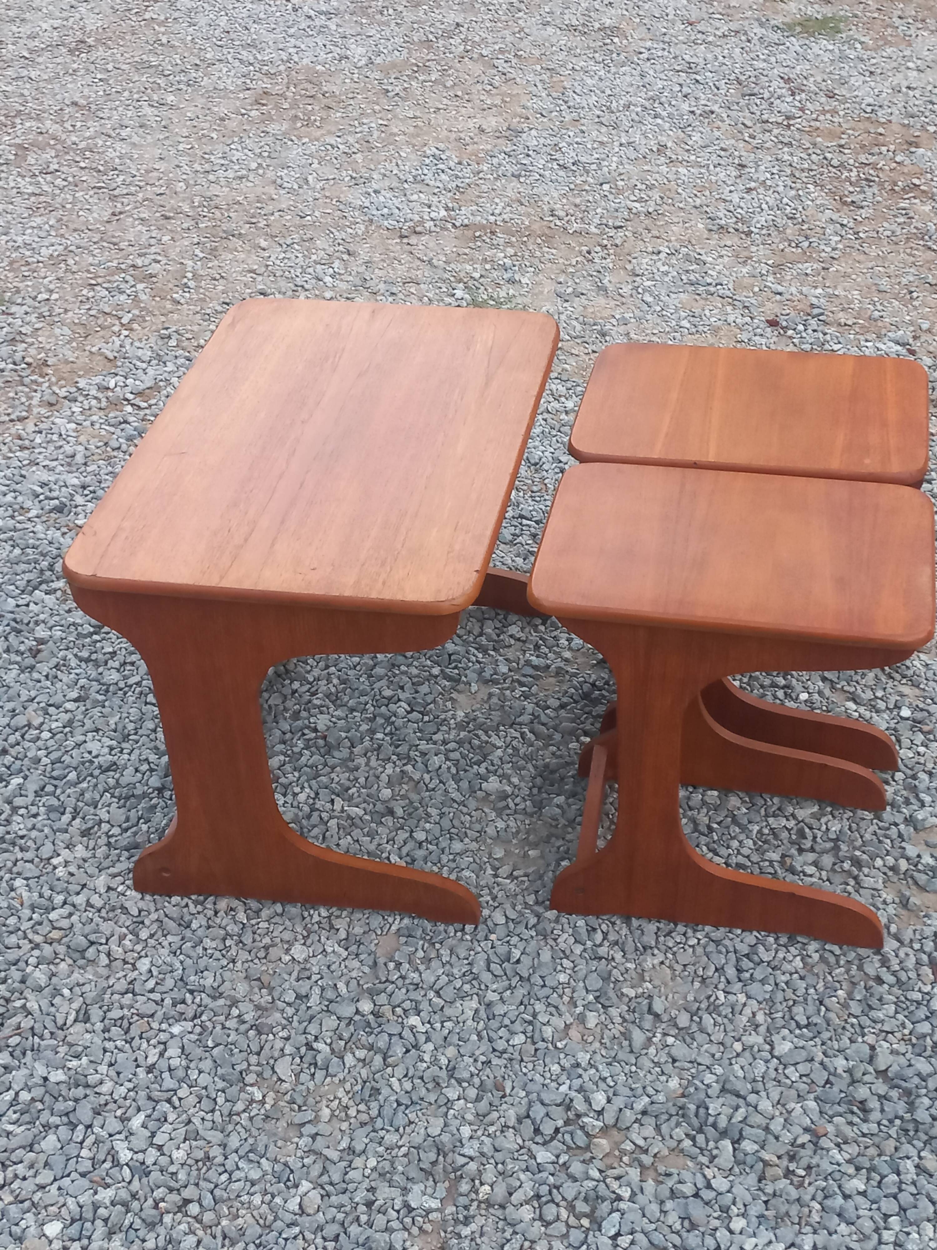 Set of 3 nesting tables in Scandinavian style made of teak from the 1970s.