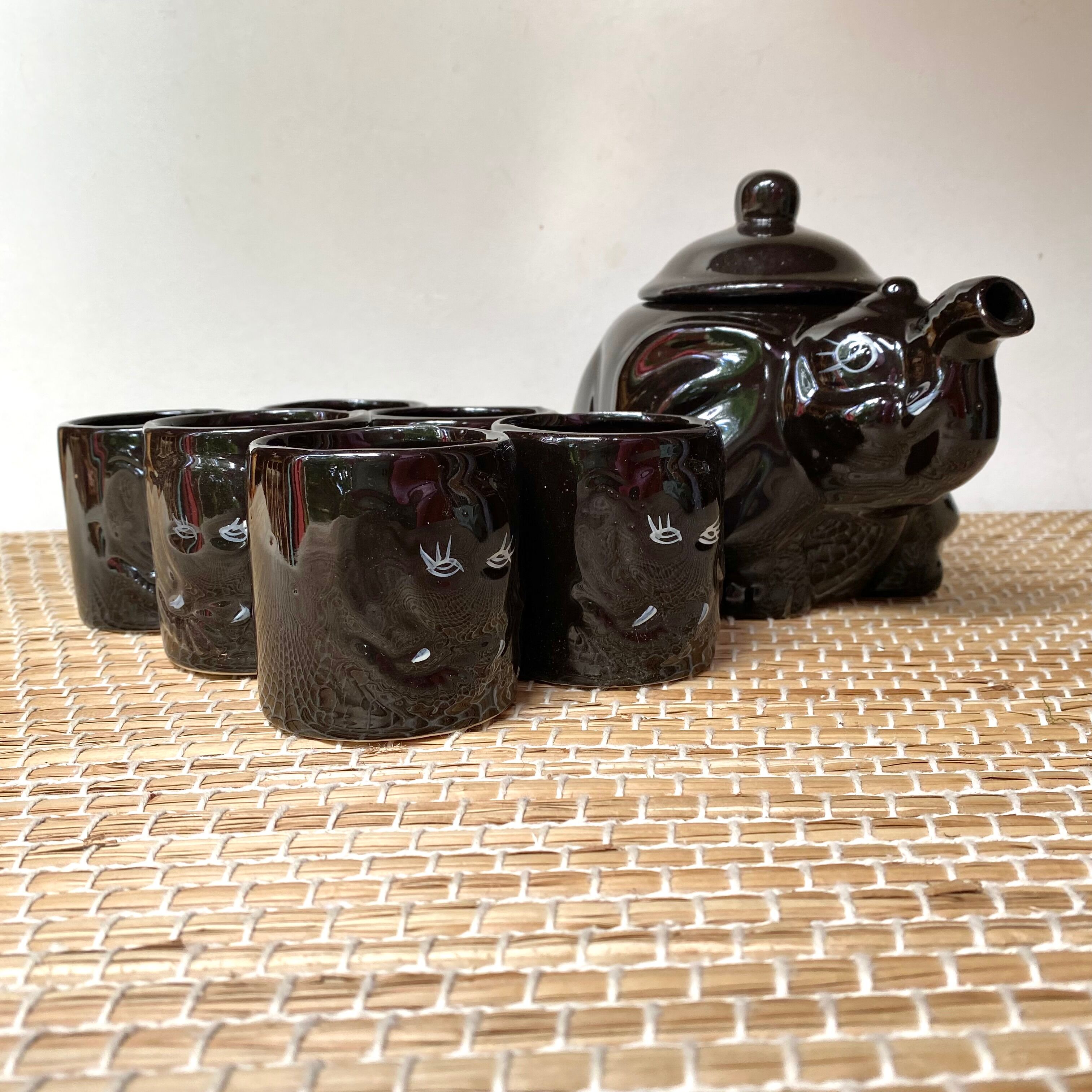 Vintage teapot and vintage elephant cups
