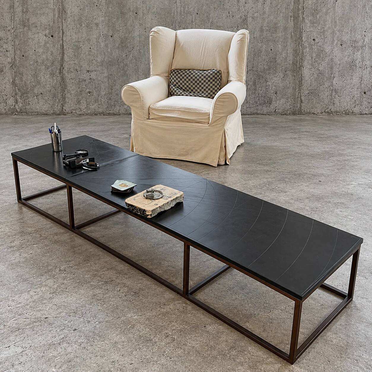 Weighty coffee table with solid iron frame and stone slate table tops, made on commission by architect Alex Vervoordt, Belgium 1990s