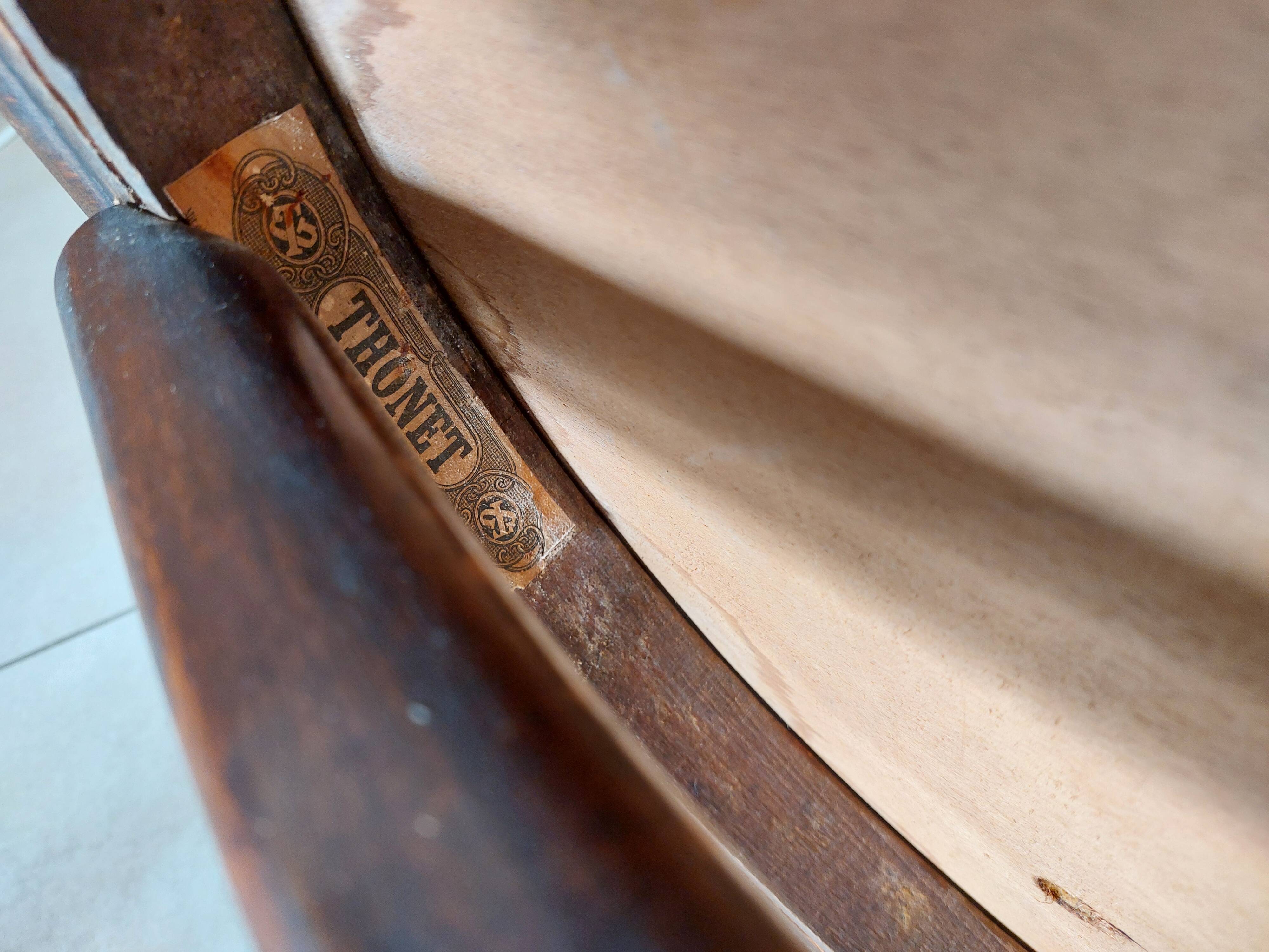 Thonet armchair, swivel, in wood and faux leather.