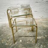 Trio of nesting tables in gold metal