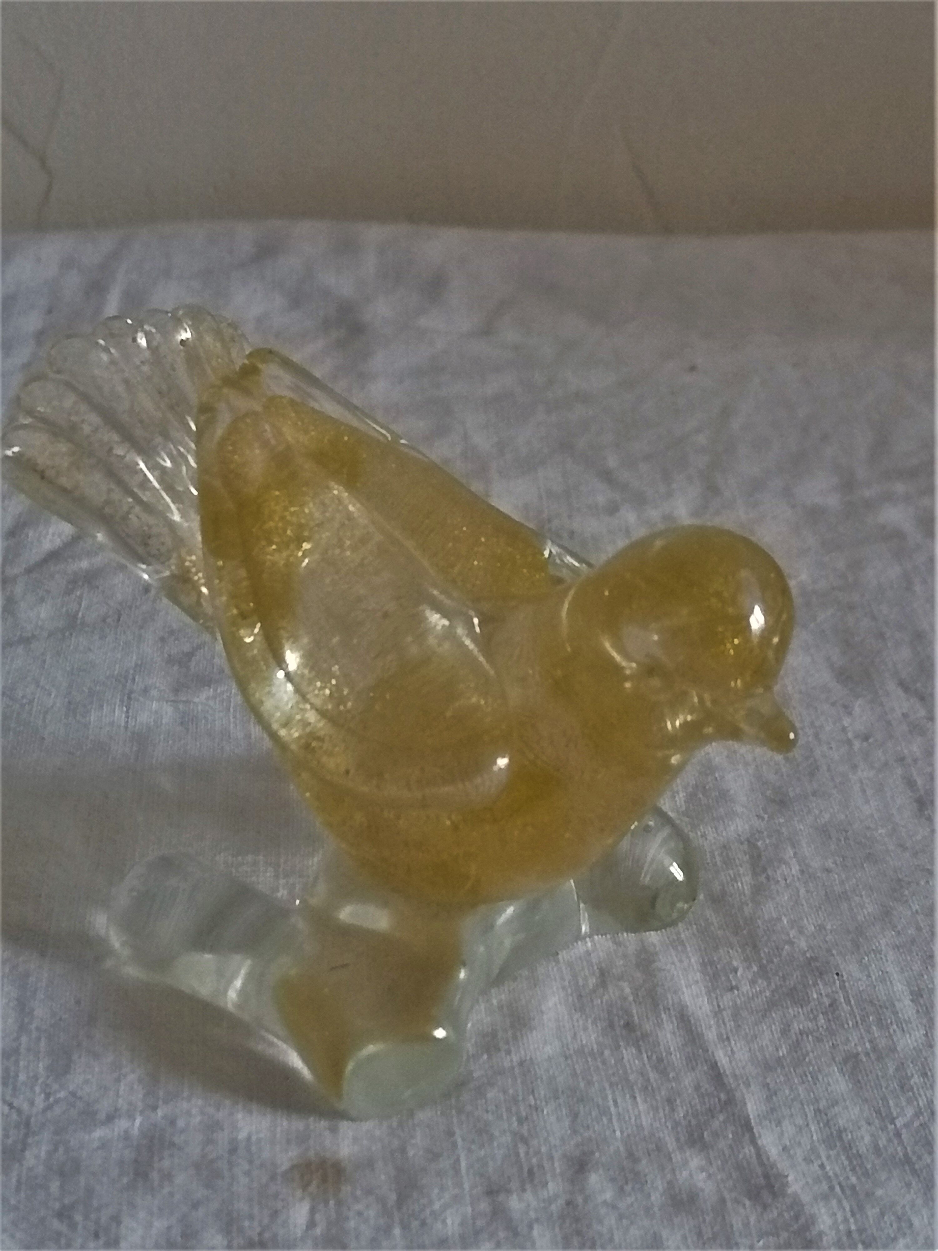 Clipboard Murano- small bird in blown glass with intercalary decoration of gold paillons.