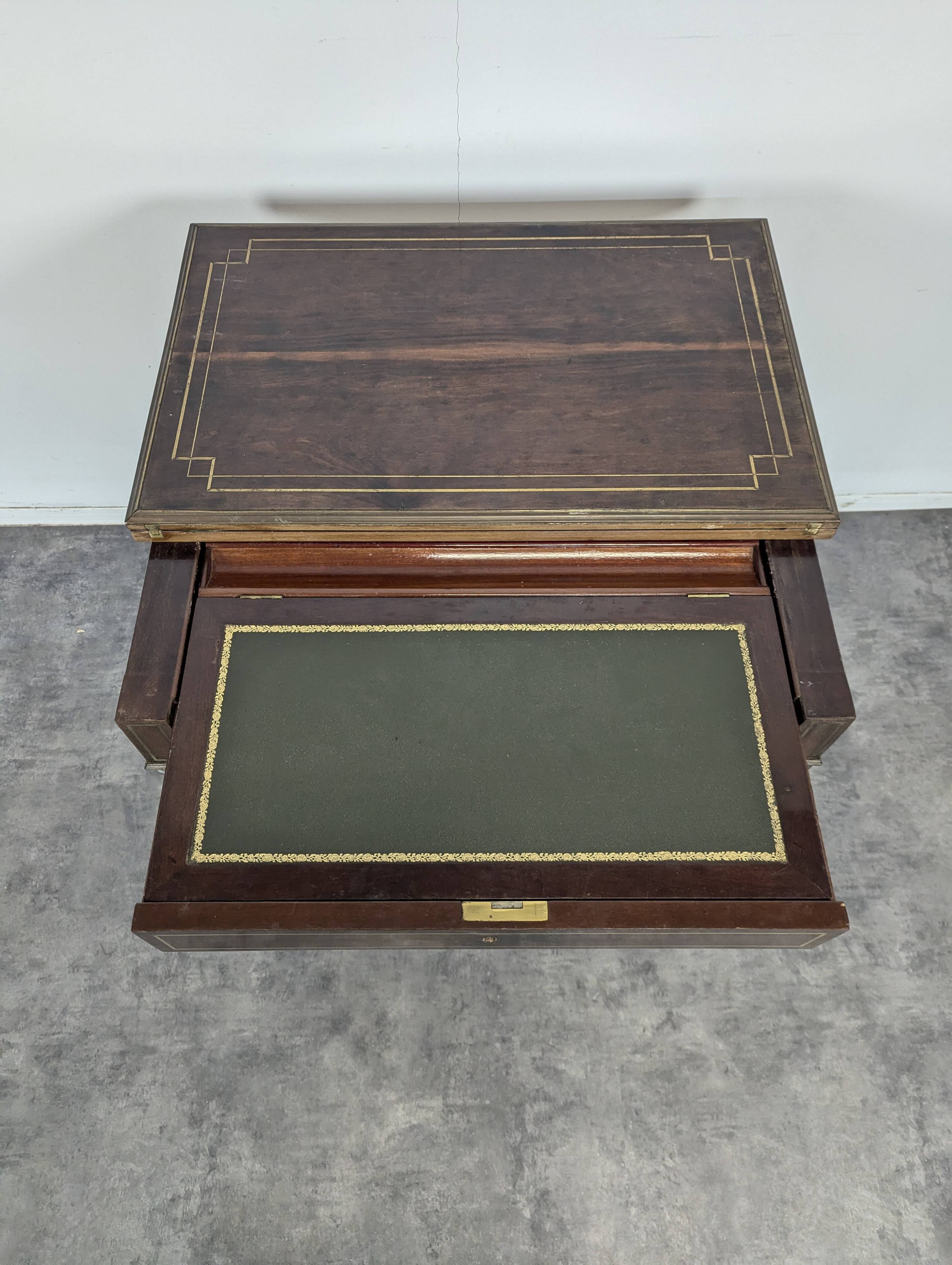 Louis XVI style mahogany game table, dressing table, and secretary.