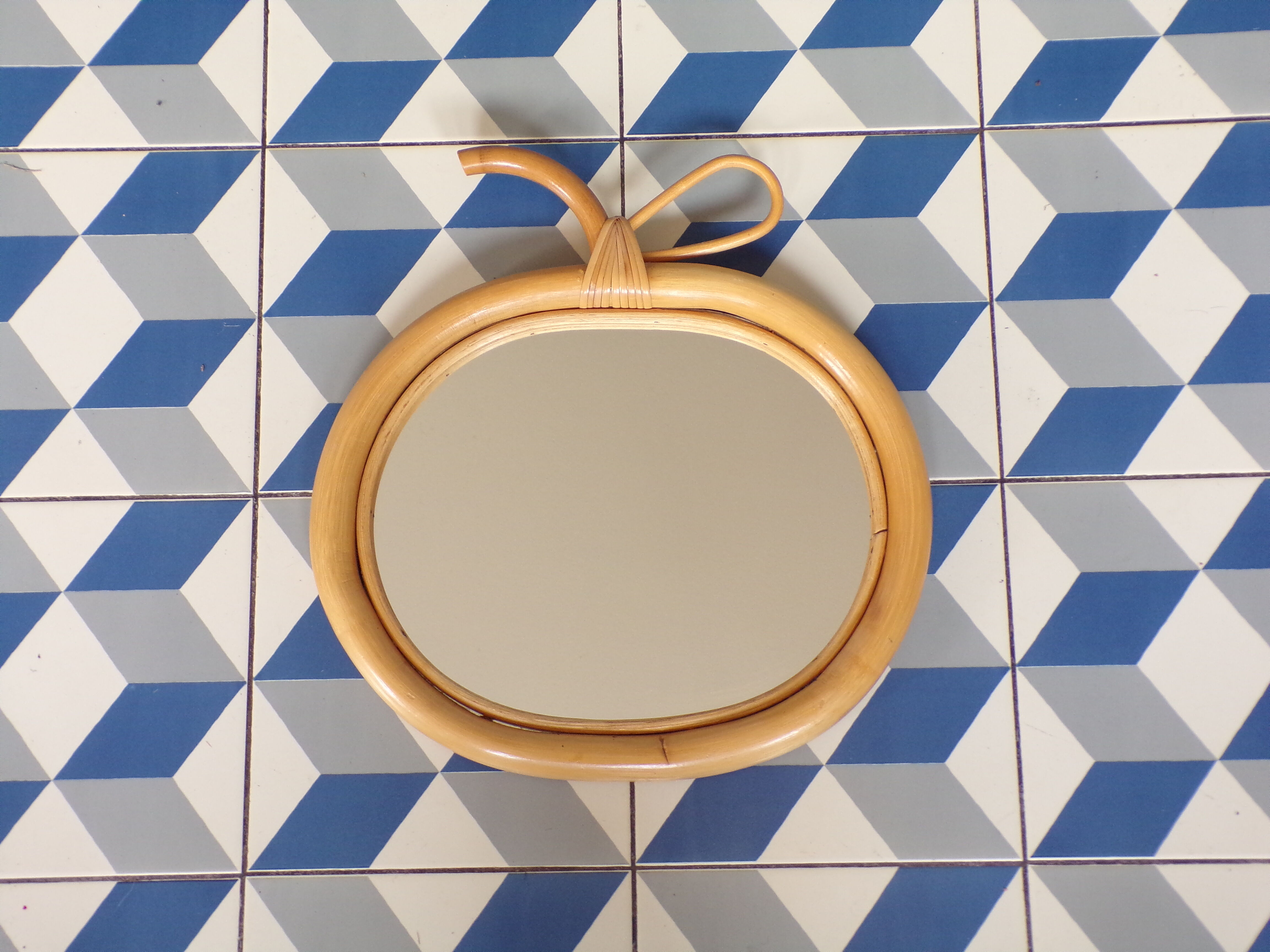 Vintage rattan apple mirror