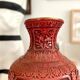 Asian metal vase and red resin
