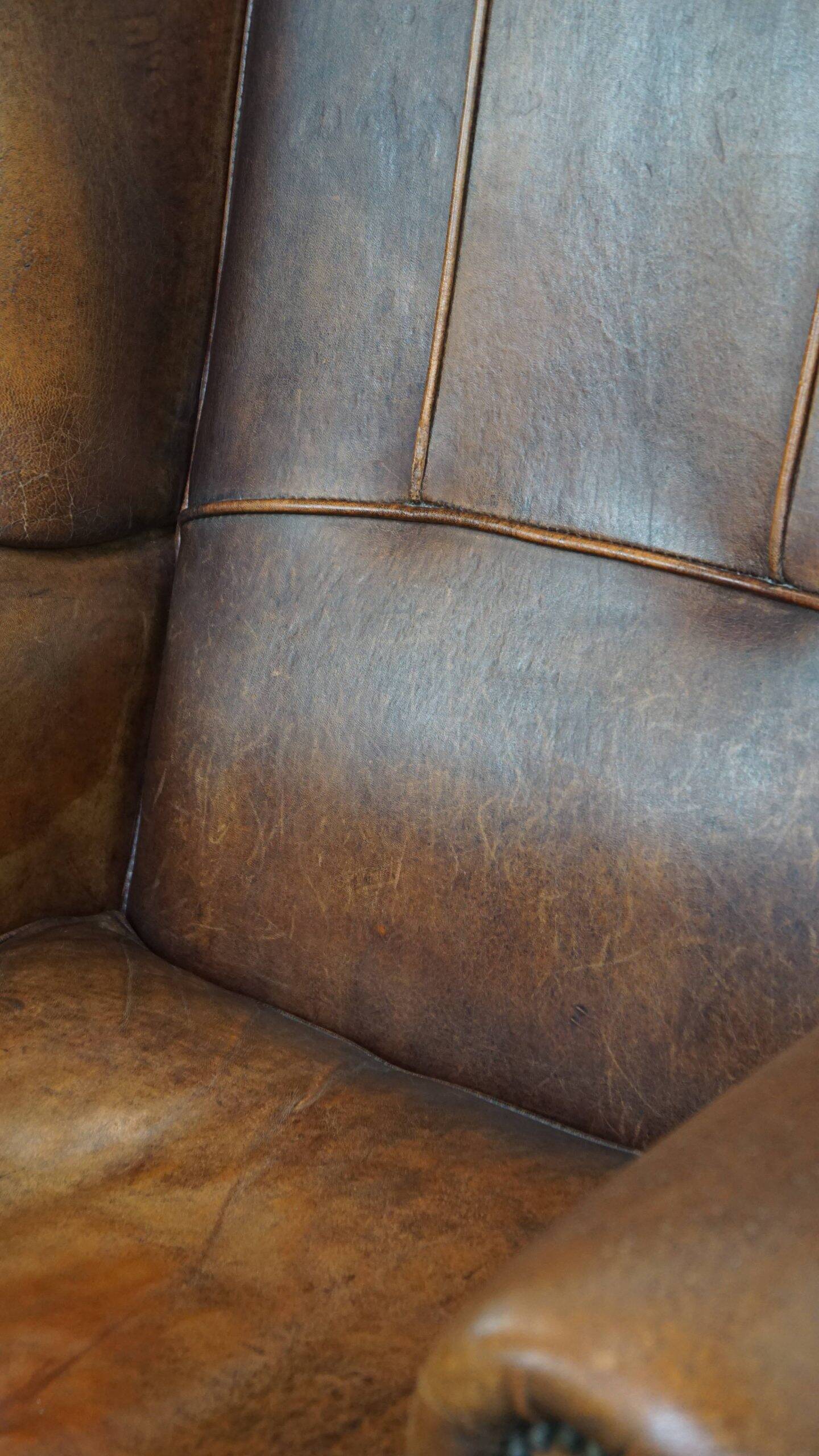 Sheepskin wingback chair in good condition