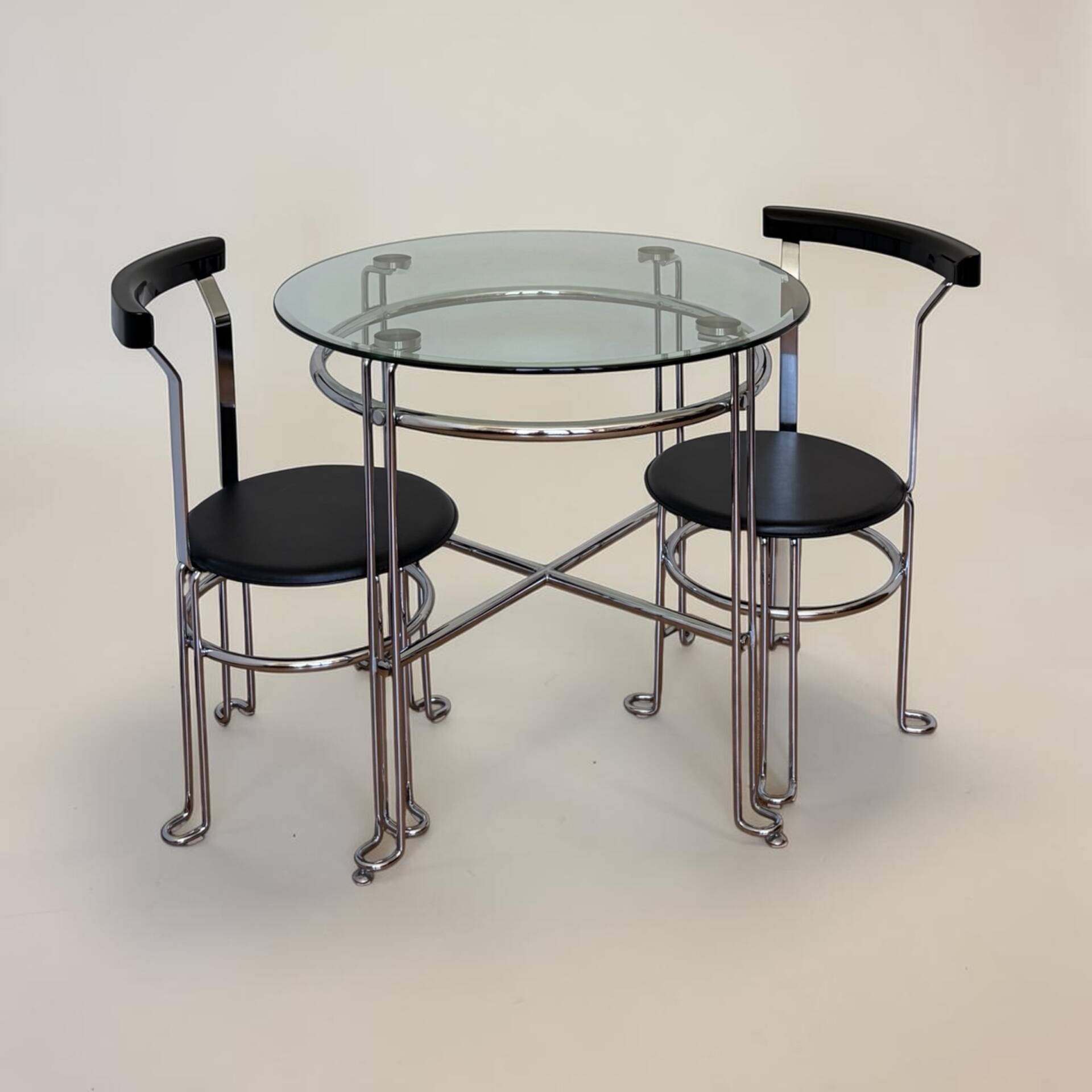 Chrome metal and glass tubular table