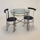 Chrome metal and glass tubular table