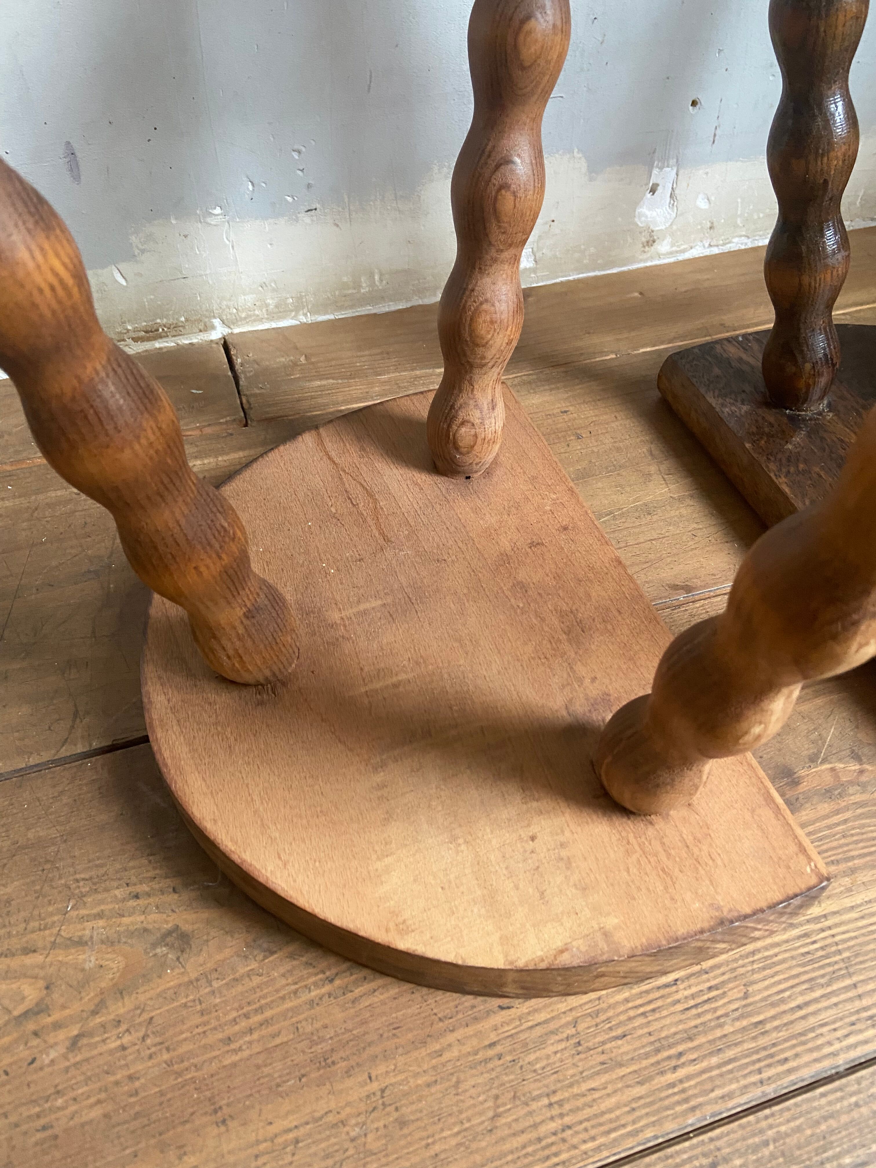 Pair of wooden milkman's stools turned brutalist
