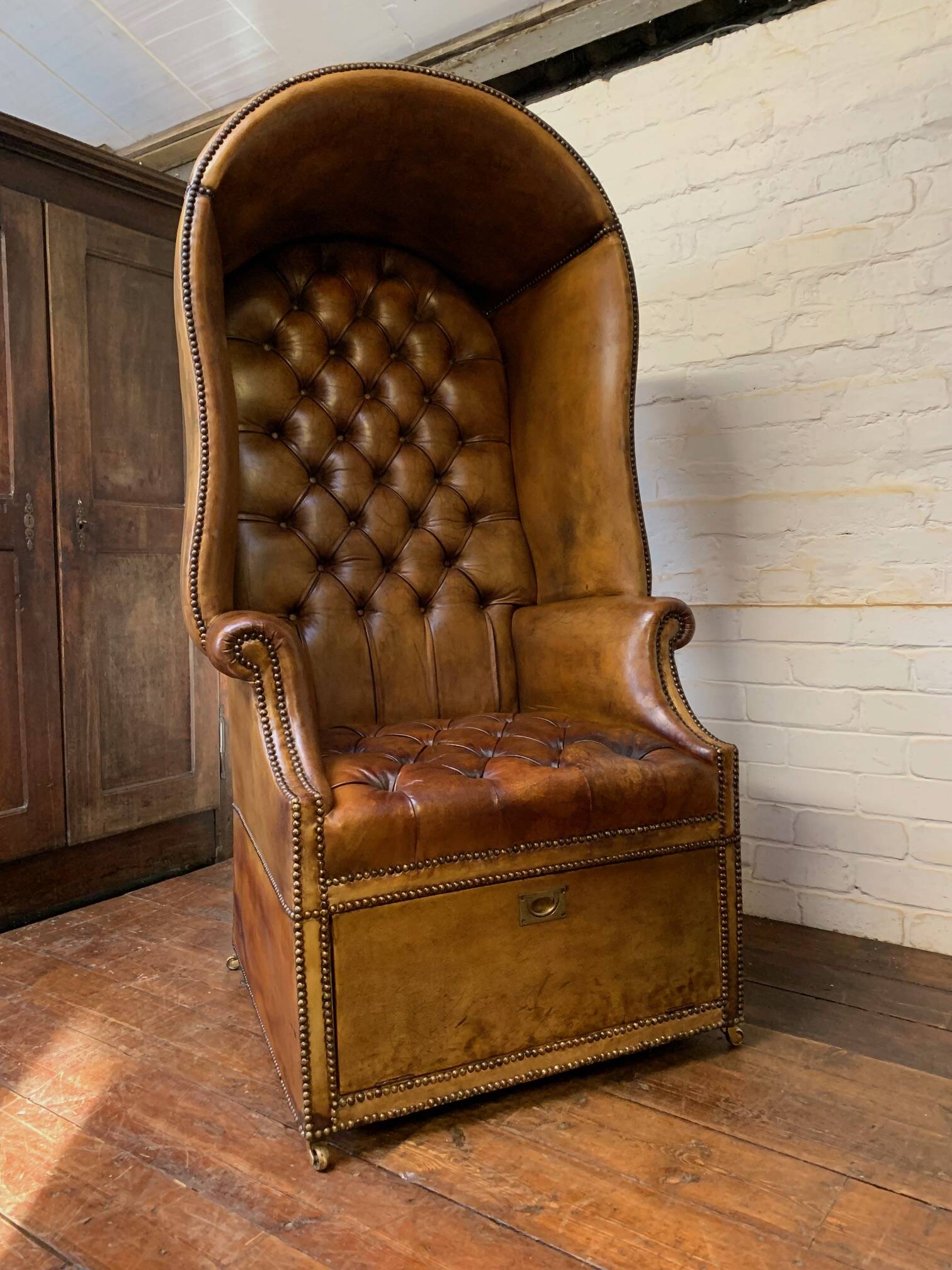 A Rare & Exceptional Deep-Buttoned Chesterfield Porter’s Chair Circa 1920’s