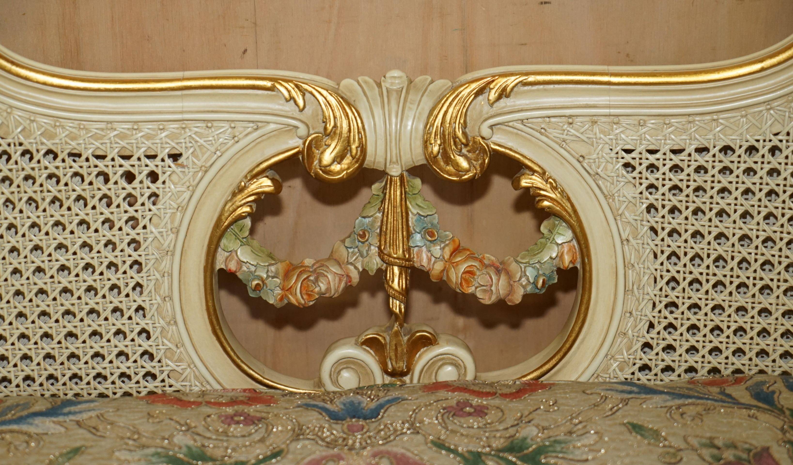 Louis XV window bench embroidered in gold and silver leaf.