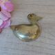 Small carved brass duck ashtray, duck pocket ashtray