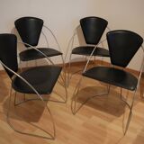 Set of 4 black leather armchairs with chrome steel frames from the 80s