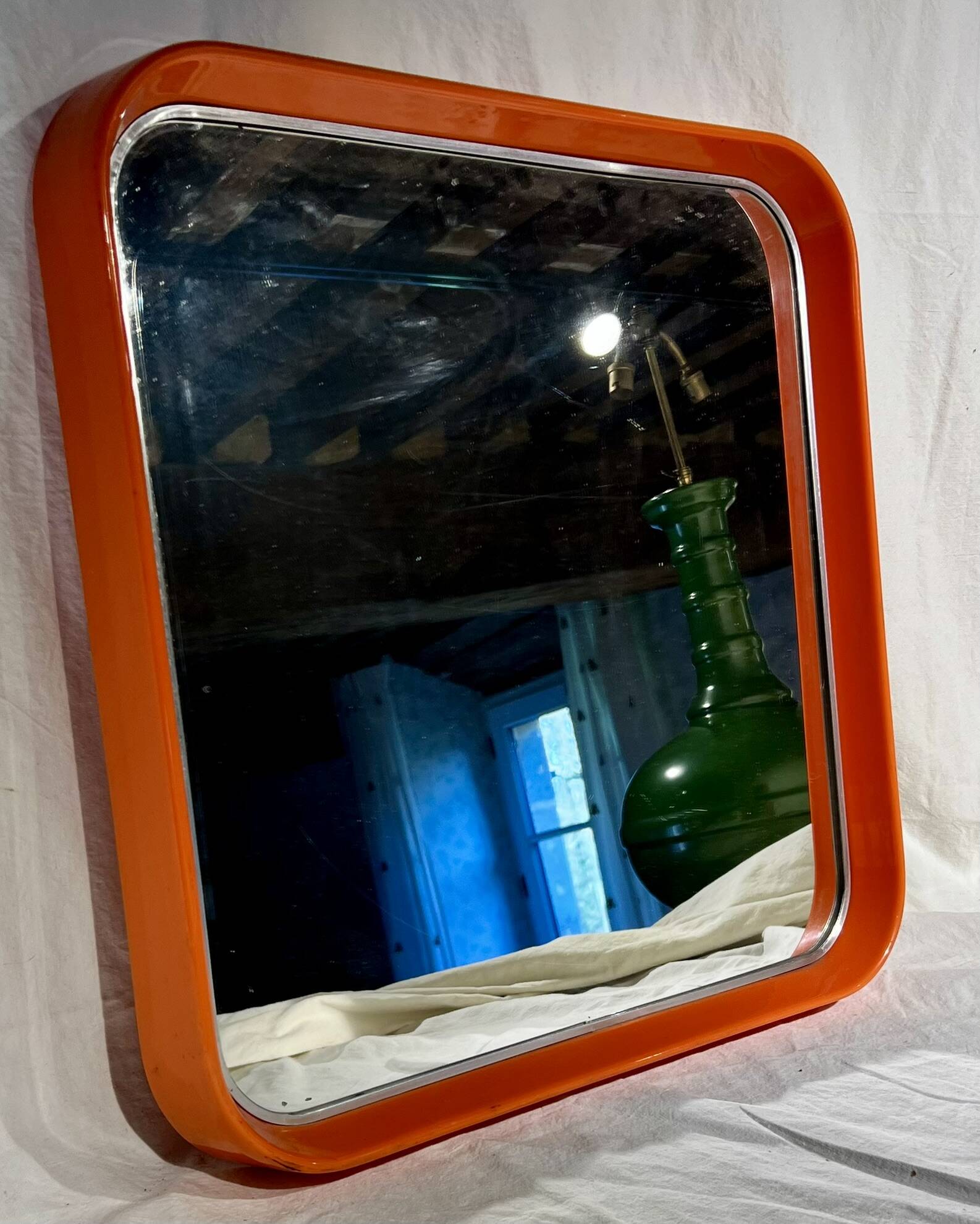 Square thermoformed mirror in orange plastic from SALC