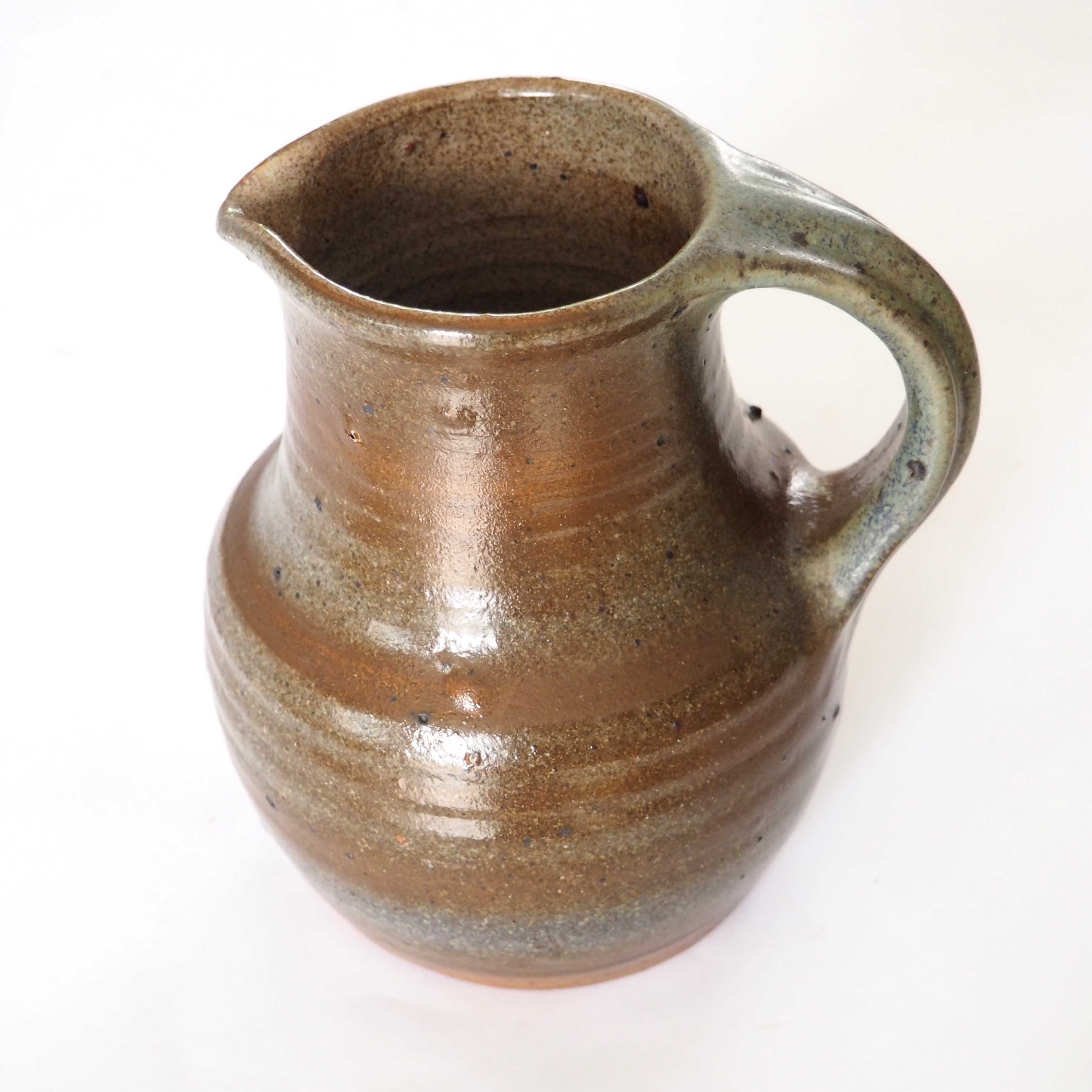 Signed stoneware pitcher