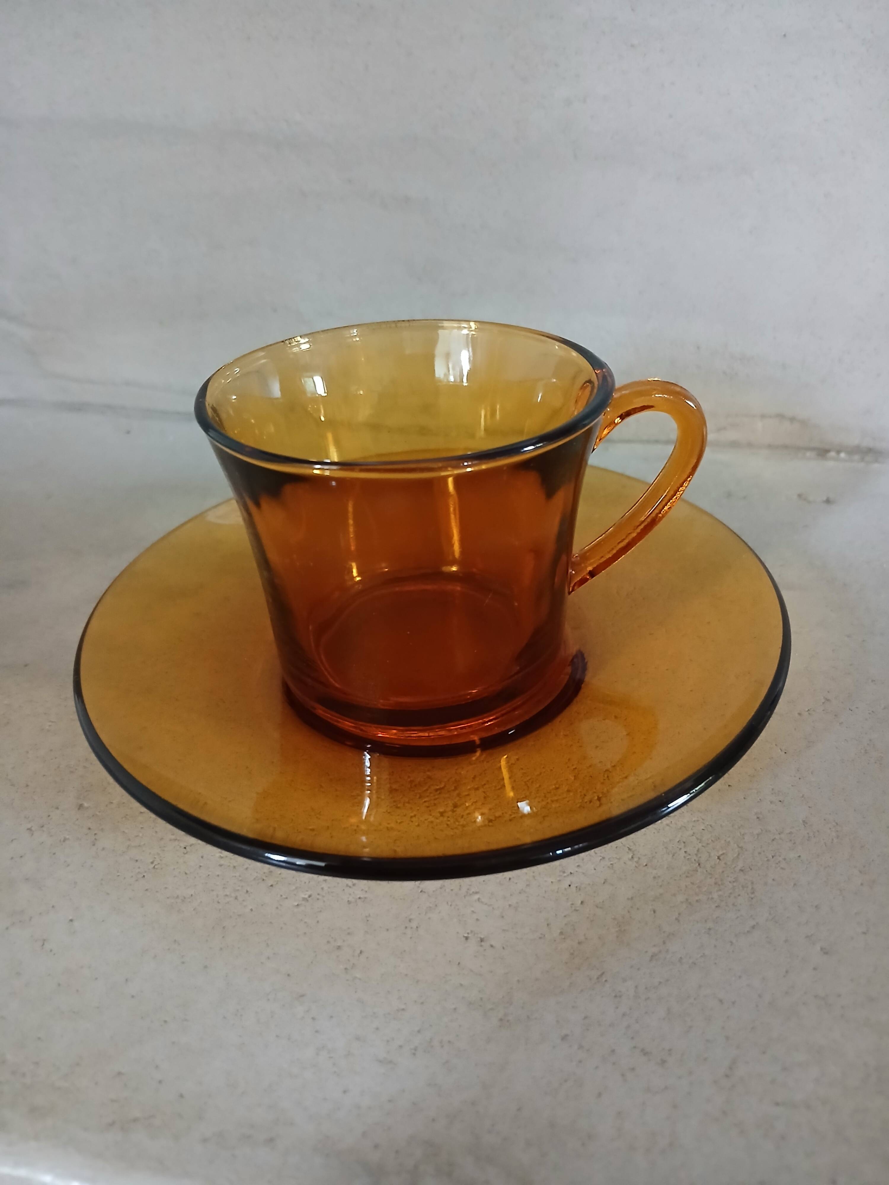 Set of 15 vintage amber Duralex coffee cups.
