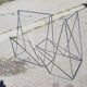 Vintage steel wire desk with chrome trestles and smoked glass top