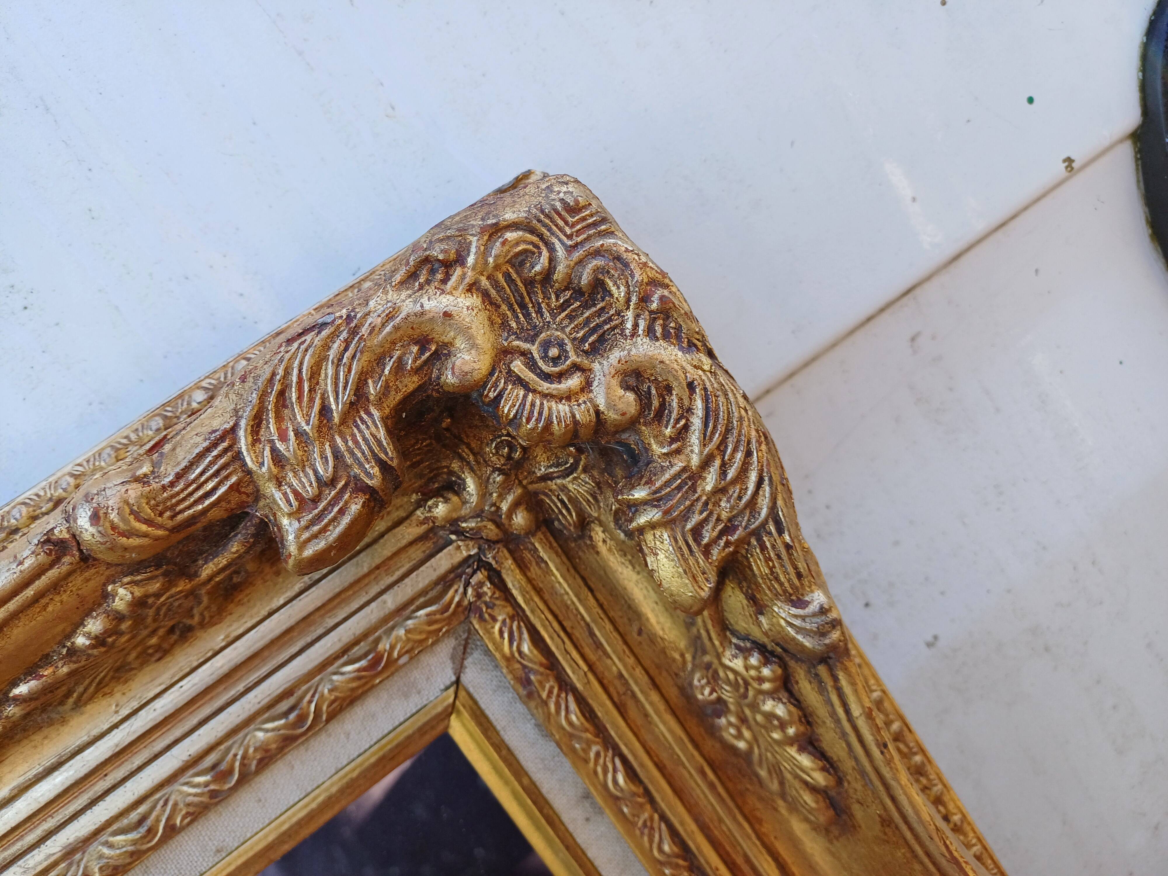 Mirror wood and gilded stucco