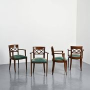 Set of four Art Deco armchairs in wood, France, circa 1940.