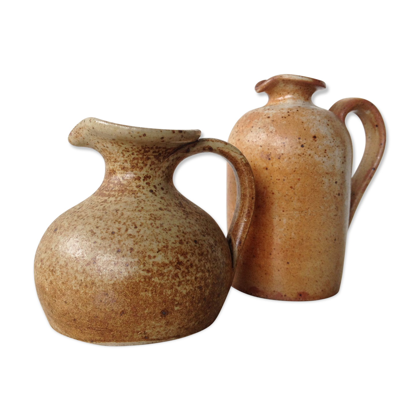 Duo of pitchers in stoneware