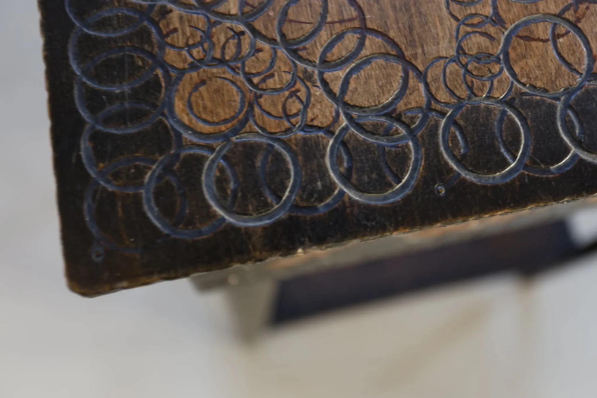 Decorated antique side table with elephant