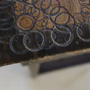 Decorated antique side table with elephant