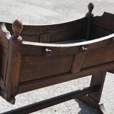 Antique cradle planter