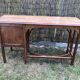 Old oak desk with curved wooden sleepers in the Art Nouveau spirit of the early 20th century.