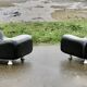 Paire de chauffeuses "space age". Simili-cuir noir. Circa 1970