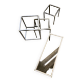 Set of coffee tables, pedestal tables and nesting tables in smoked glass and metal
