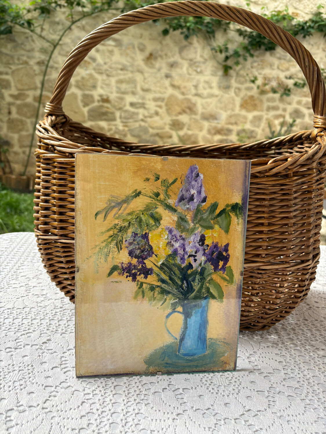 Acrylic painting of flowers in a jug.