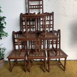 6 carved wooden chairs with cane seats