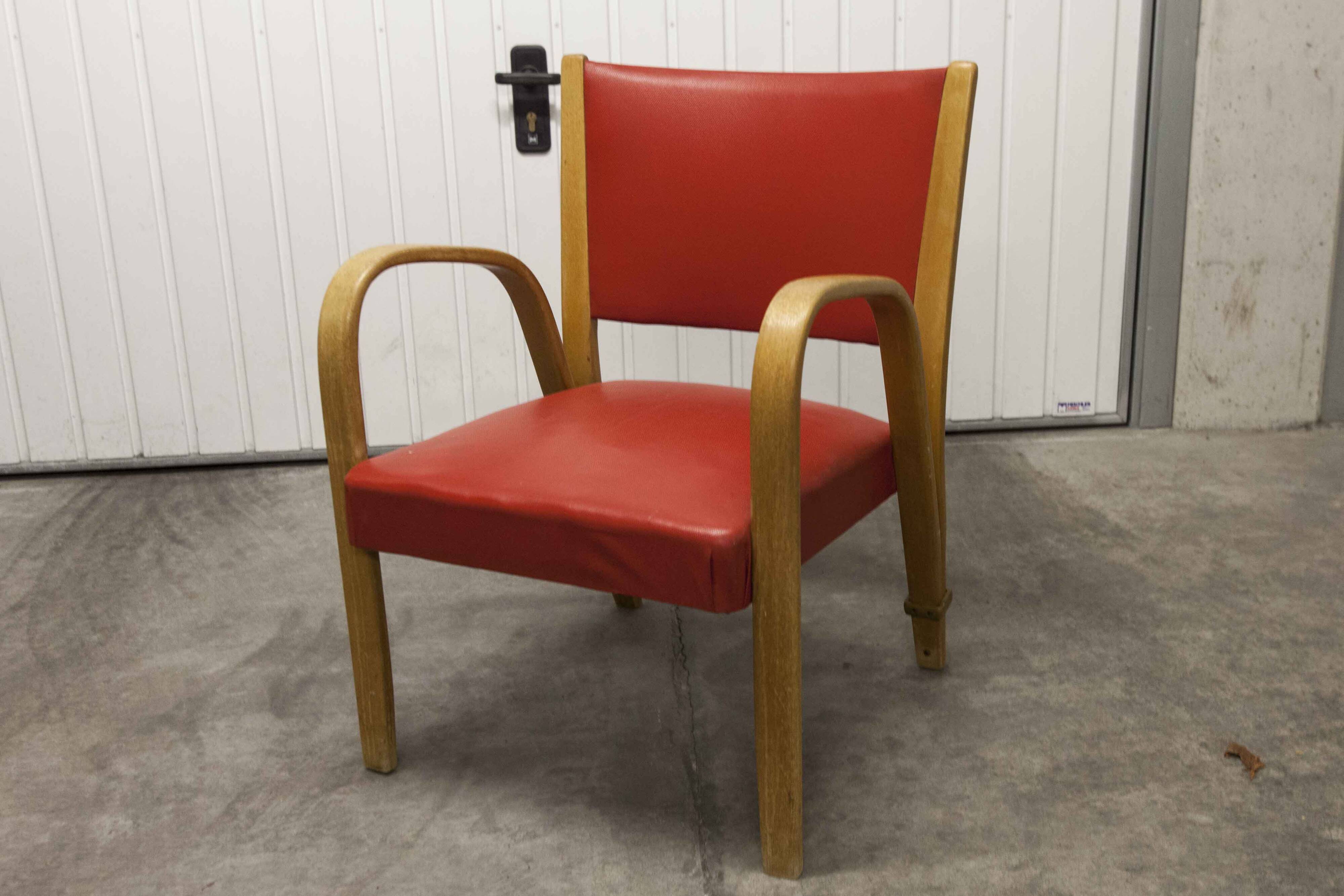 Bow wood armchair by Hugues Steiner 1960 red