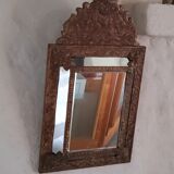 Mirror with parecloses