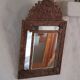 Mirror with parecloses