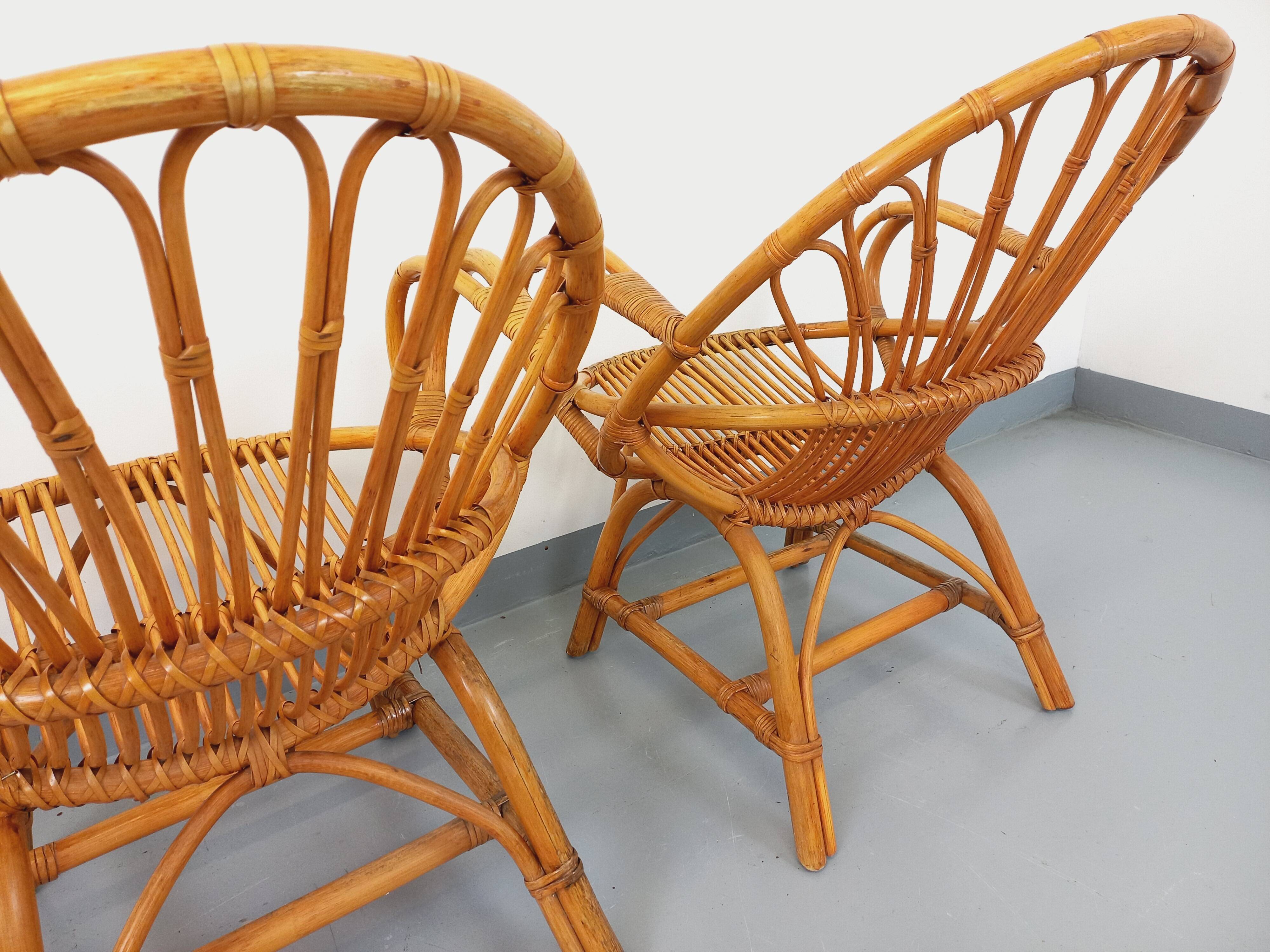 Pair of vintage rattan armchairs from the 60s